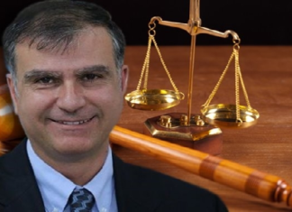 أمين محفوظ: “مشروع الدستور تضمن ضربا للنظام الديمقراطي”