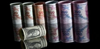 الليرة التركية تحوم قرب أدنى مستوياتها أمام الدولار