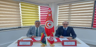 البريد التونسي يُمضي اتفاقية تعاون في الخدمات البريدية مع بريد ليبيا